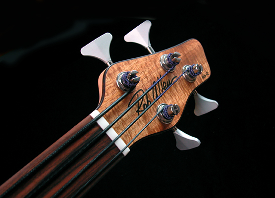 closeup view of a bass head on the back of a guitar
