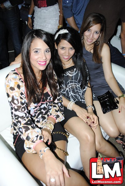 three girls are smiling together at the party