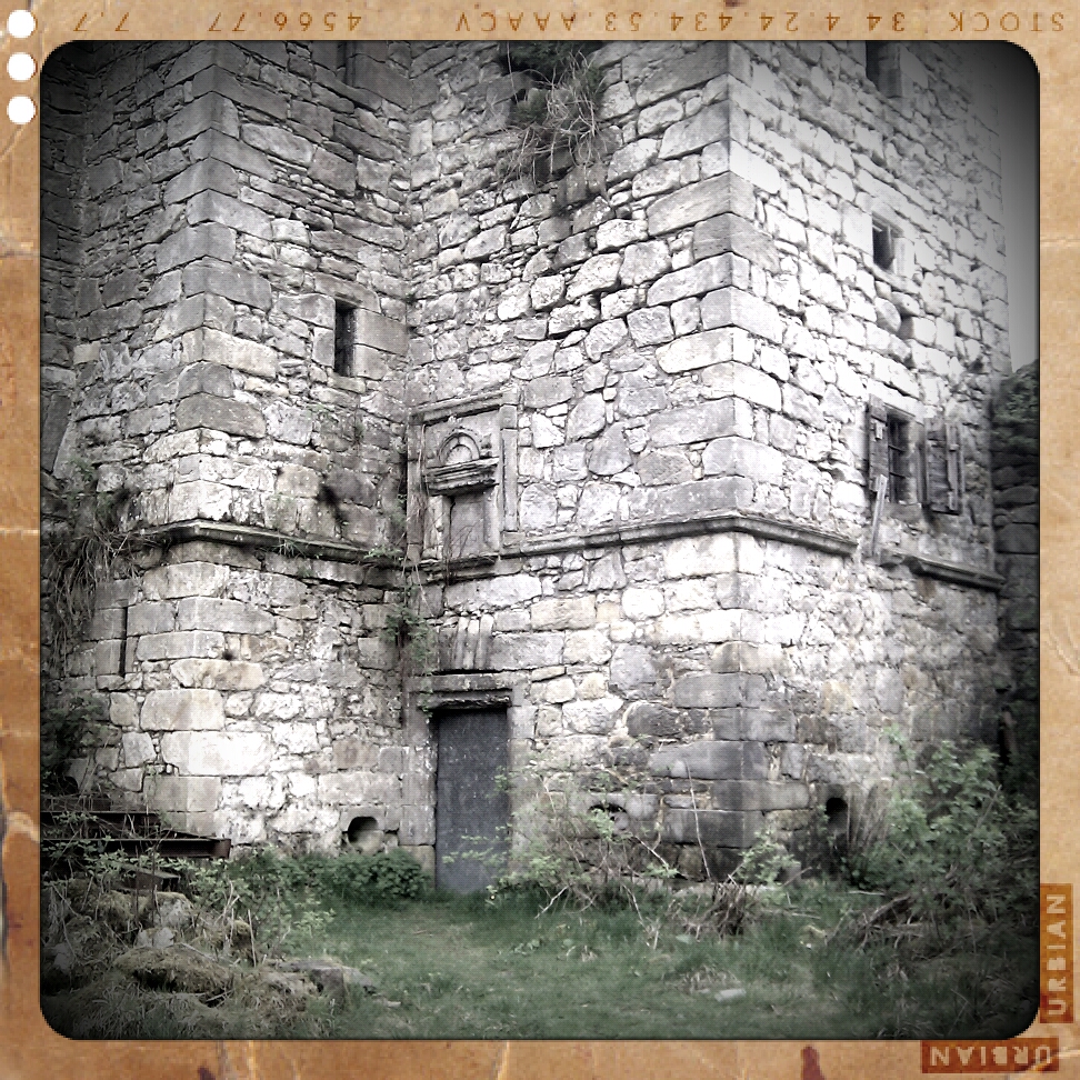 an old castle building is pictured in this black and white pograph