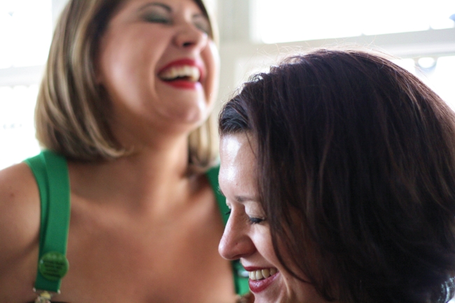 two women are laughing and having fun
