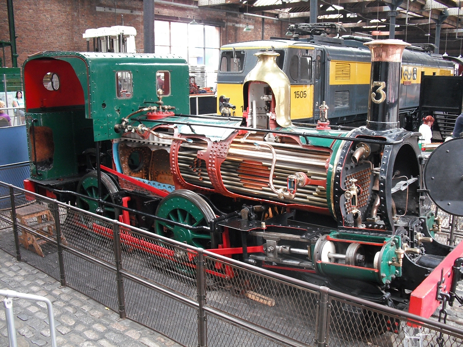 an old locomotive is being displayed at a museum