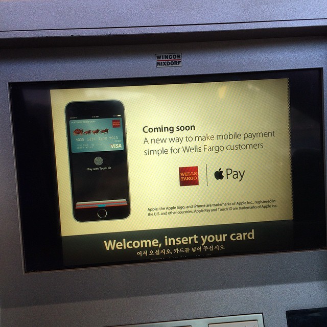 a picture of an advertit on an atm machine