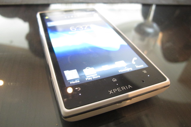 an lg xperia cell phone on a glass table