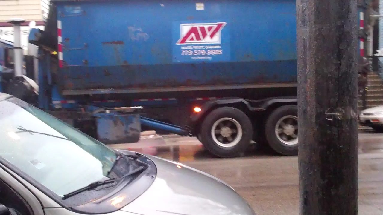 the truck is parked near a telephone pole