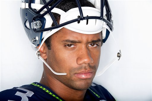 a close up of a football player wearing a helmet
