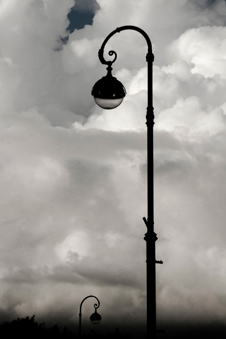 a street light and street light with sky background