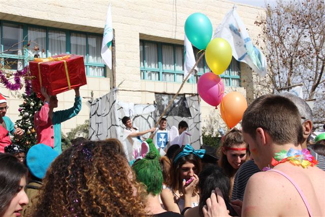 people crowding at a party outside a building