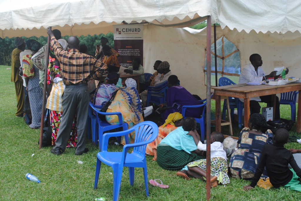 a group of people are gathered under a tent