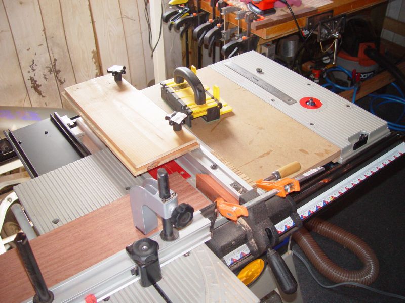 a table sawing on a table in a garage