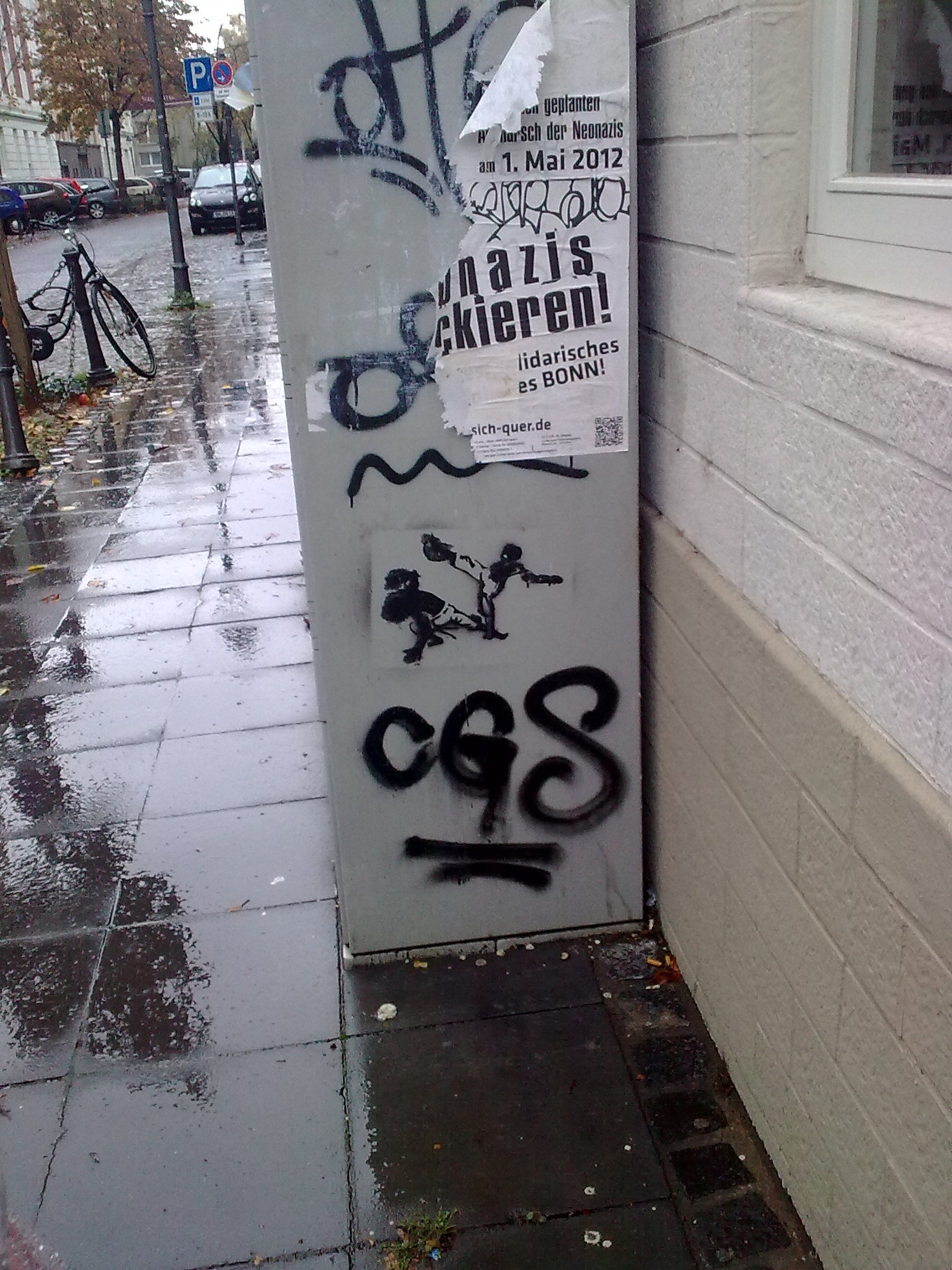 graffiti has been spray painted on an icebox