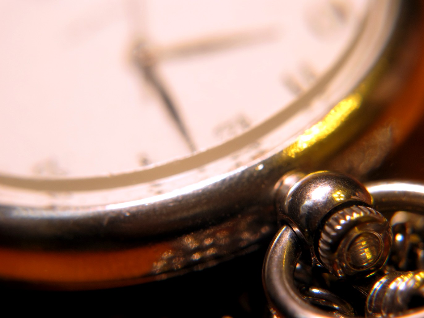 a close up view of a watch with the keys still attached