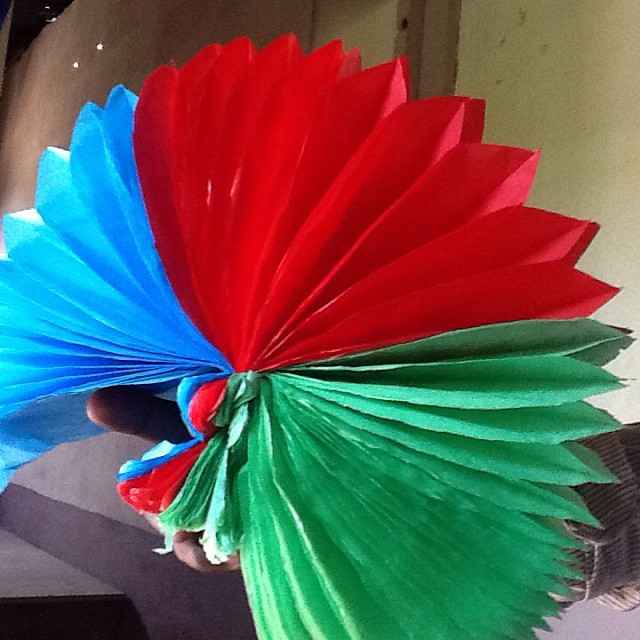 some very colorful umbrellas in someone's hand