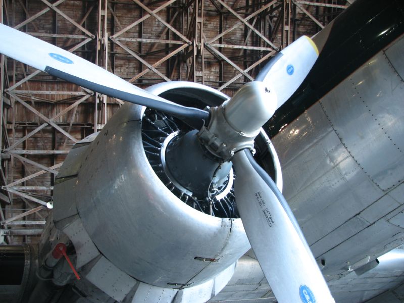 the propeller on an old airplane in a museum