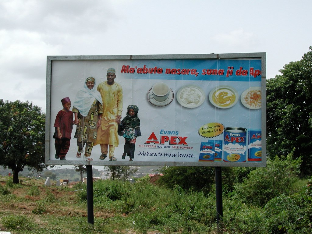 large advertit sign of various people and foods