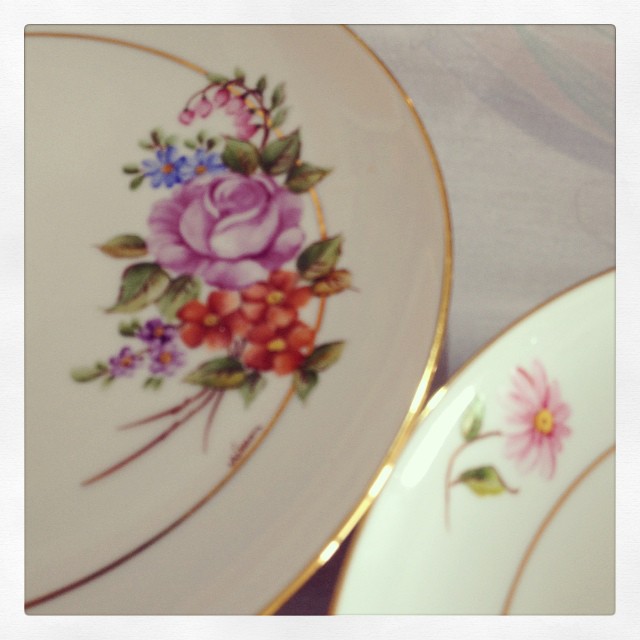 close up view of plates decorated with flowers