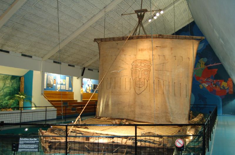 an old ship is displayed in a museum