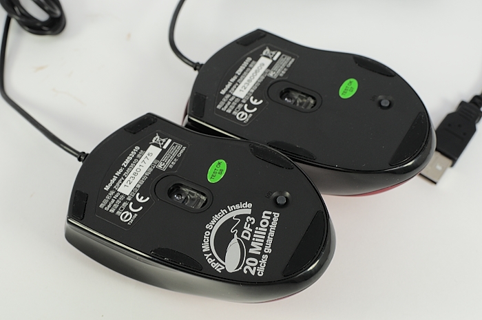 the two computer mouses are wired to the computer