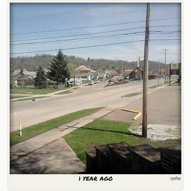 an empty street is pictured in this image
