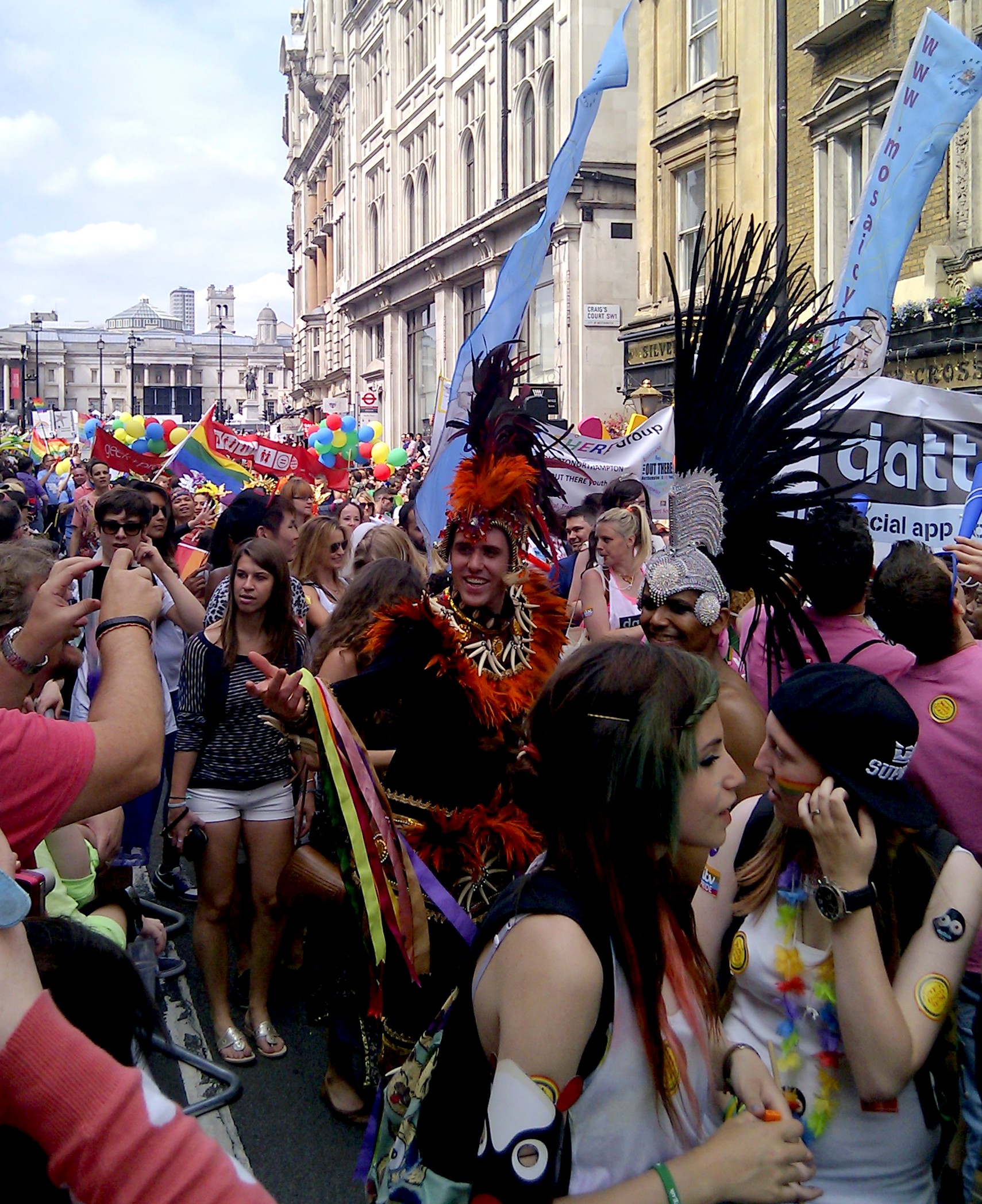 a large crowd at the gay pride parade