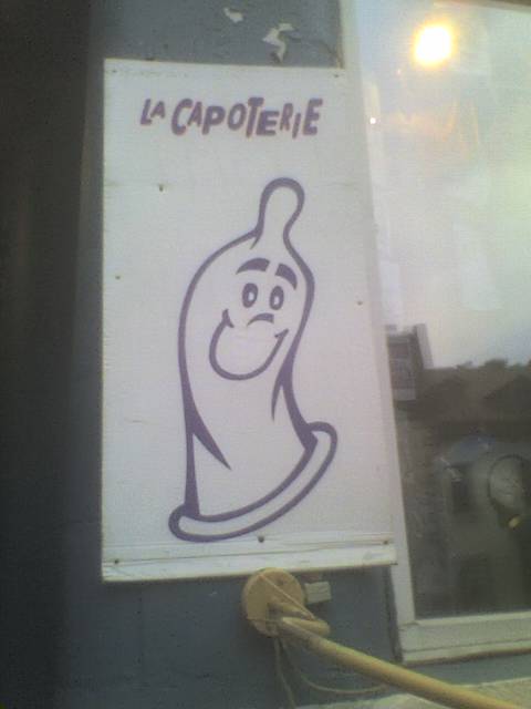 a sign that has been decorated with a drawing