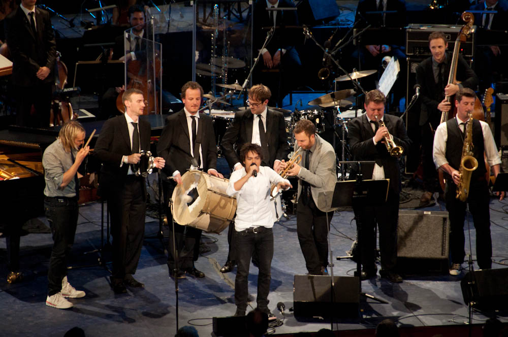 a group of men that are on stage