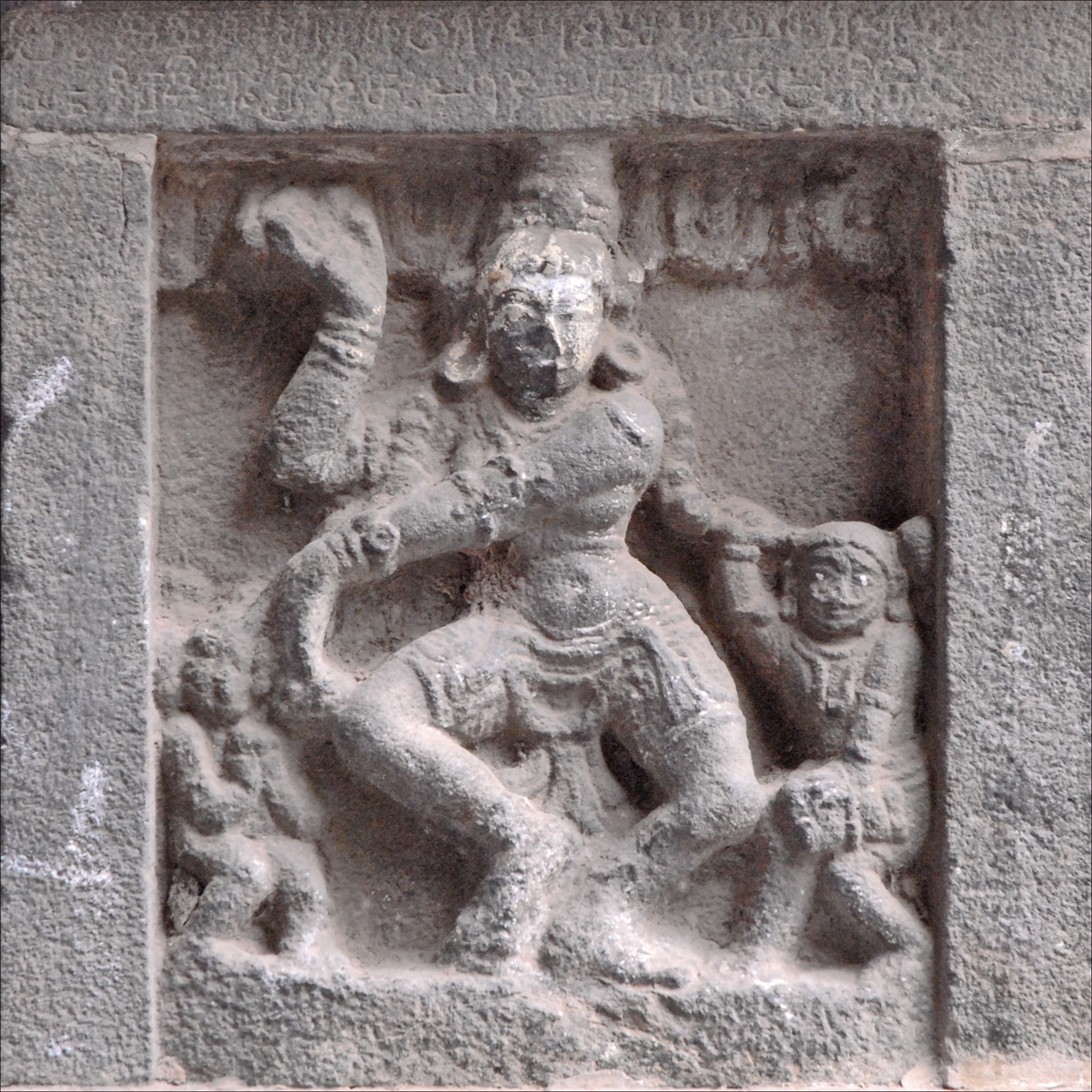an ancient style carving made from cement