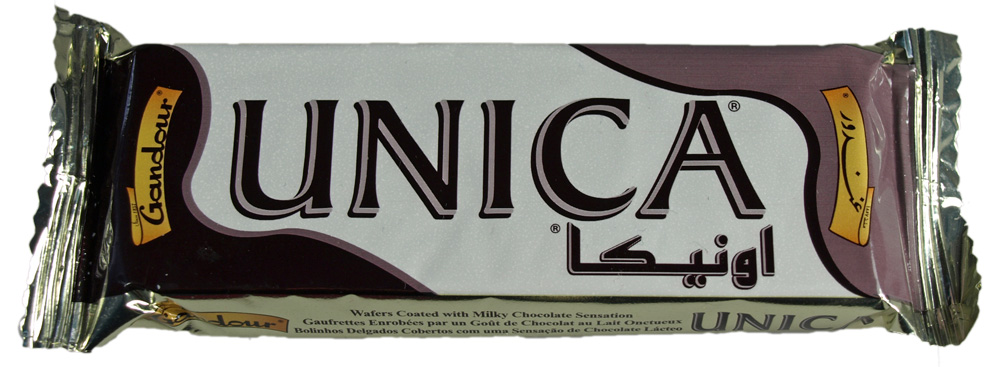 an unoca bar wrapped in foil on a white background