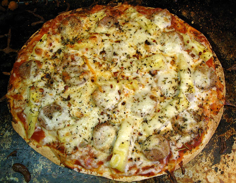 a large pizza that is on top of a table