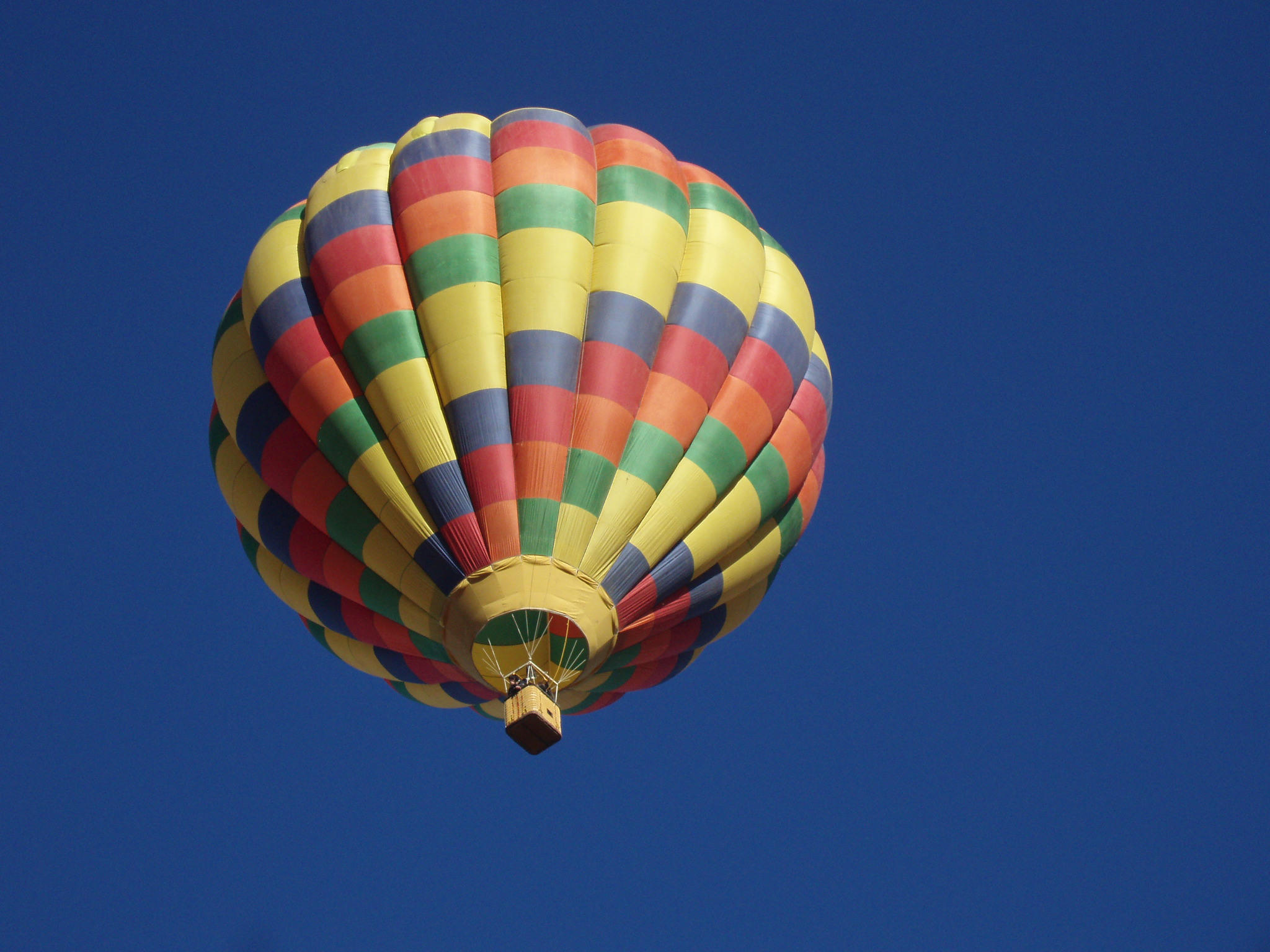 a colorful  air balloon flying in the air