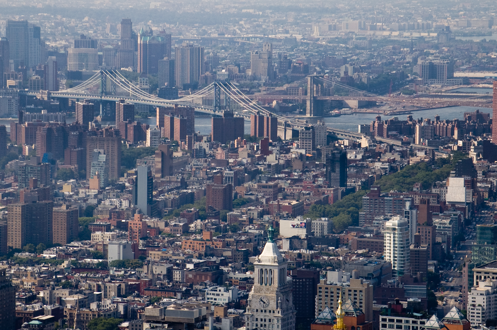 large city skyline with bridges over the water