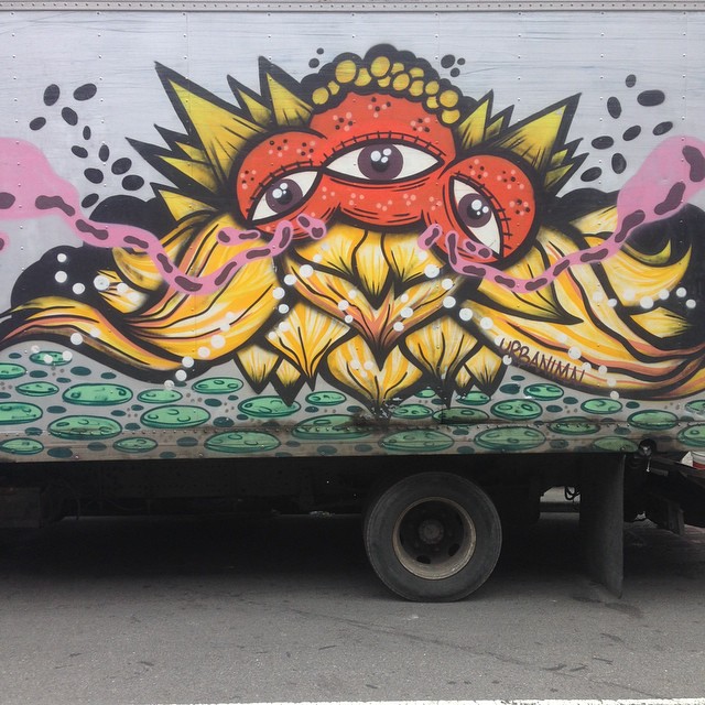 a colorful truck is shown with an eye drawn on it