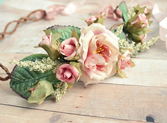 a rose bouquet sitting on top of a table