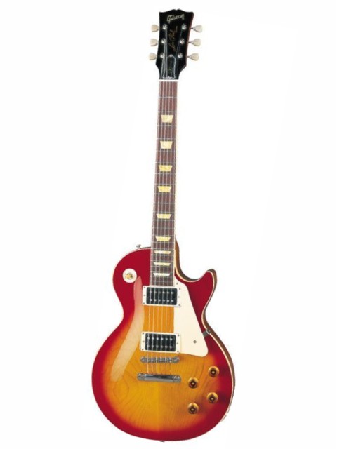 the electric guitar has a red and yellow body