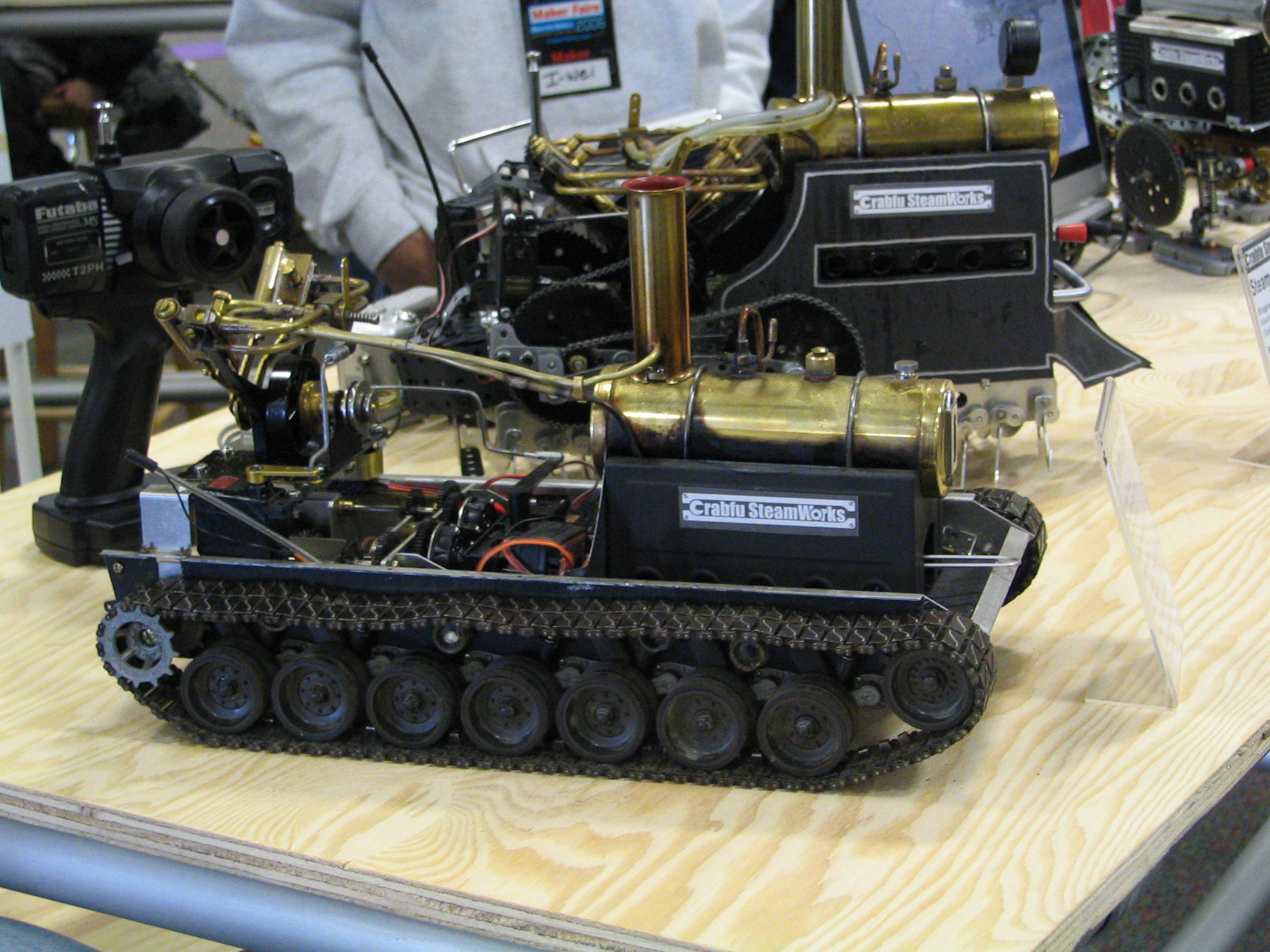 a man is working on an old model of a bulldozer