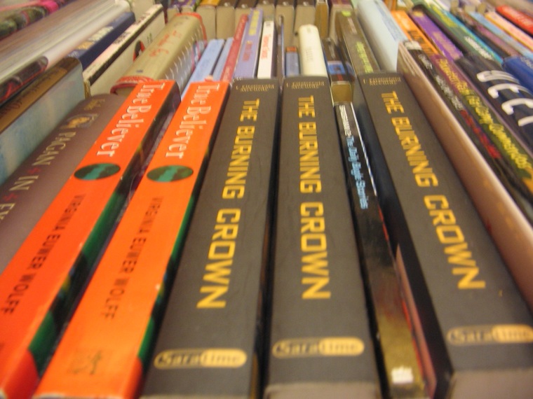 a collection of books sitting on a table