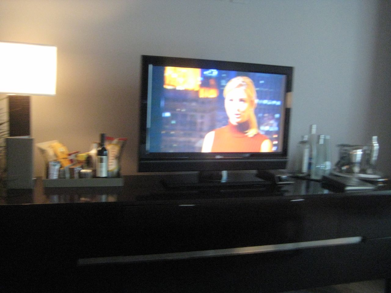 television with a woman on screen in room