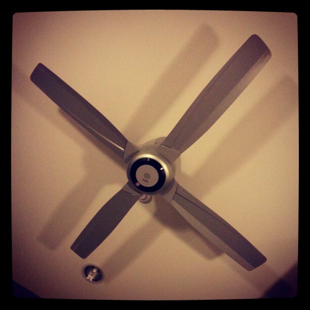 a ceiling fan with the blades showing that it is close