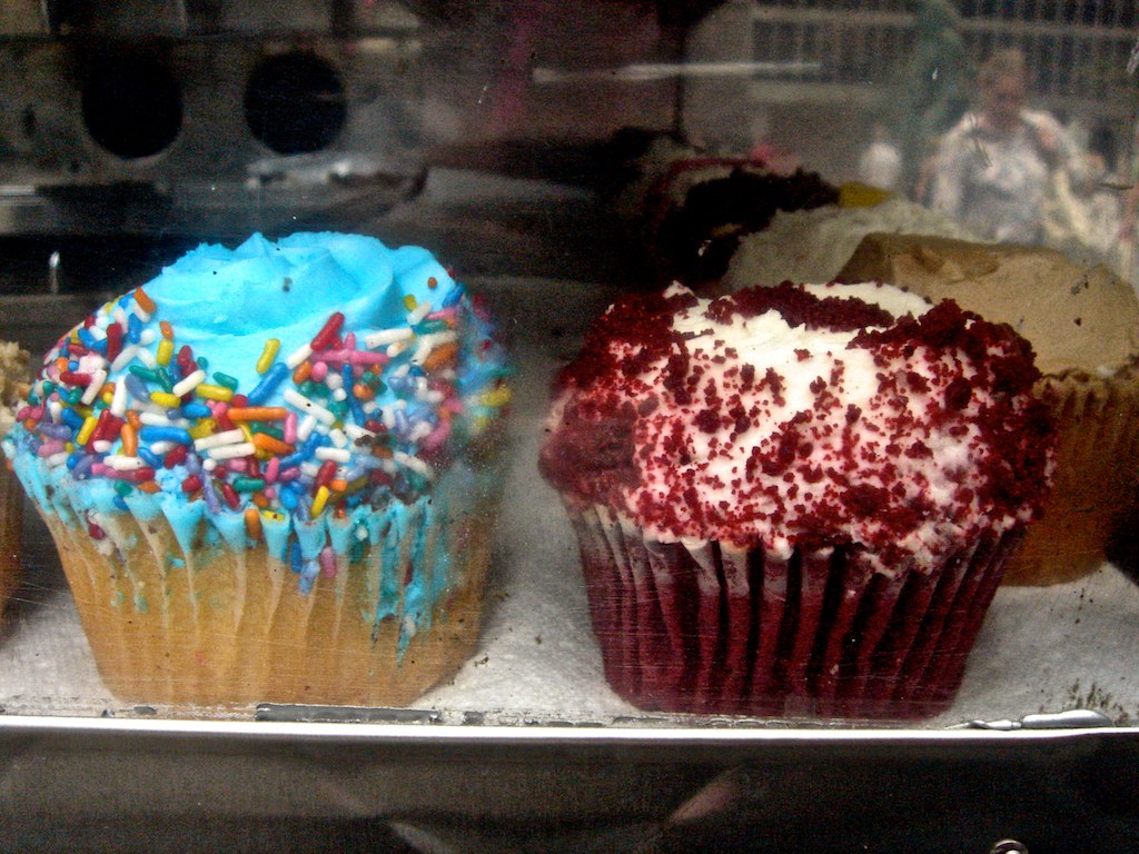 a close up of a number of different cupcakes