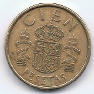 a close up of a coin with a crown