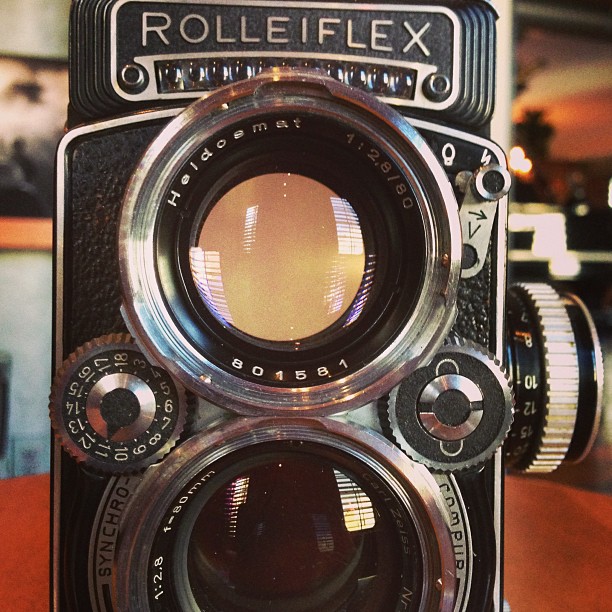 an antique rollei - flex camera with its own lens