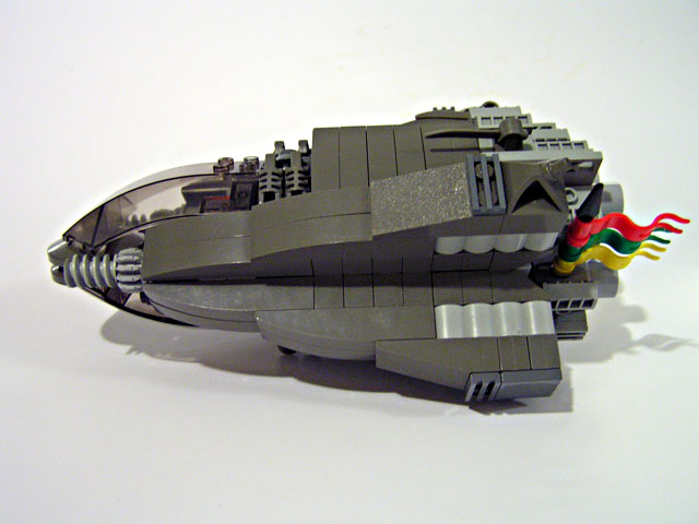 a small lego model of a black fighter jet
