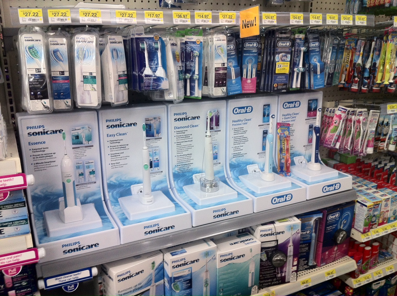 the shelves in a store are full of electric toothbrushes
