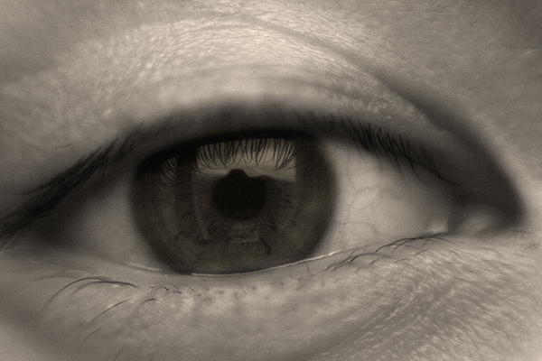 black and white pograph of eye close up