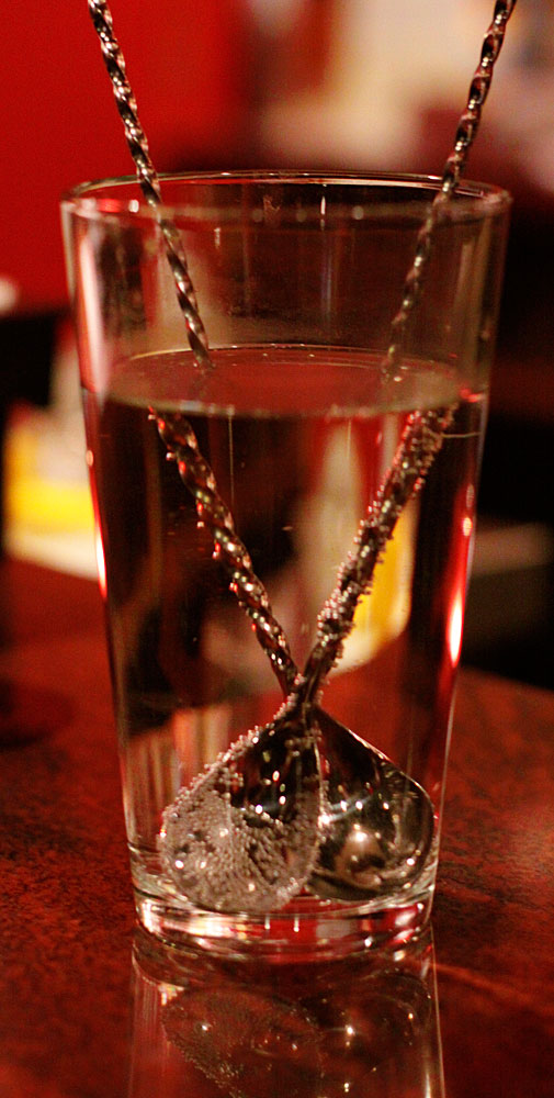 an image of a glass with some straws