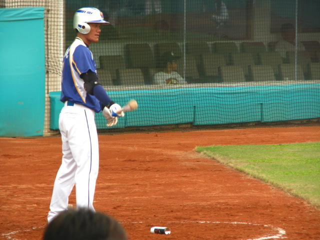 the baseball player waits for the ball to come to him