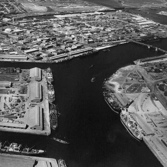 an old picture of a small port