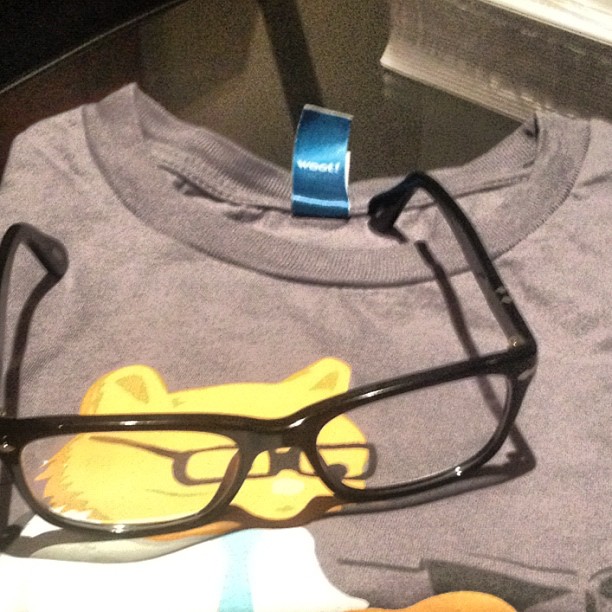 there is a tee shirt with some glasses on it