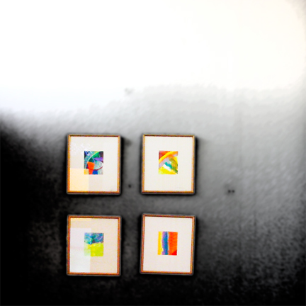 an abstract picture is shown in four square pos