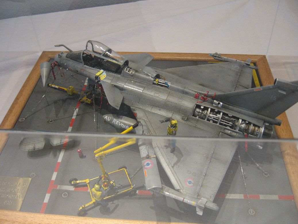 a model plane is shown on display at the exhibit