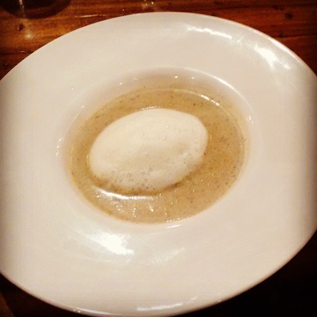 a small bowl is filled with soing white